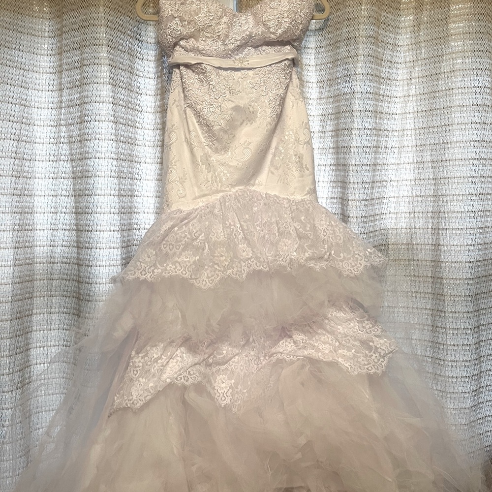 Never worn wedding dress from an online boutique that I couldn’t return